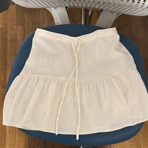 Brandy Melville Cream Mini Skirt